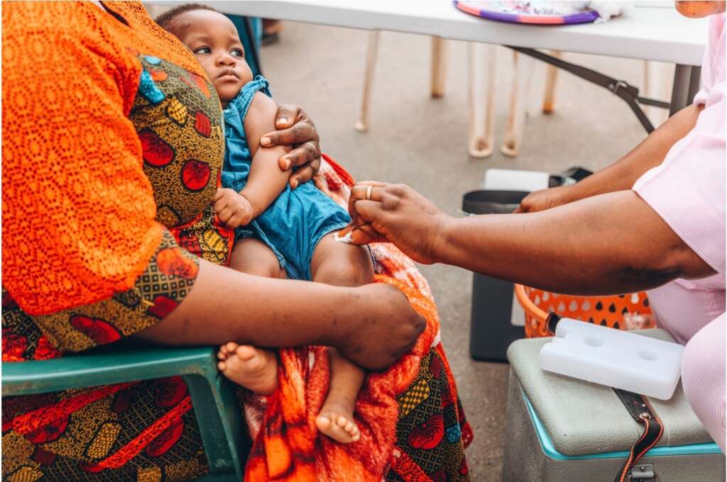 malaria vaccine applied on a child